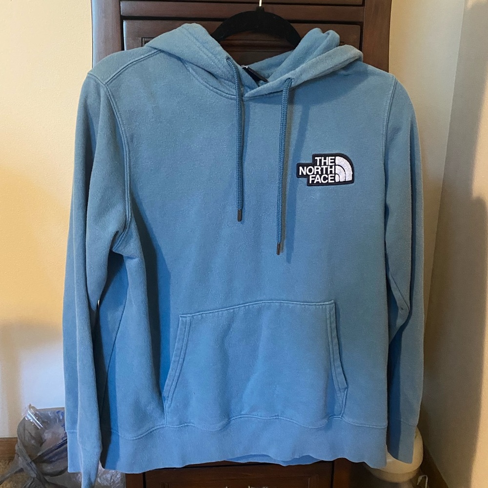 Woman’s North Face hooded sweatshirt